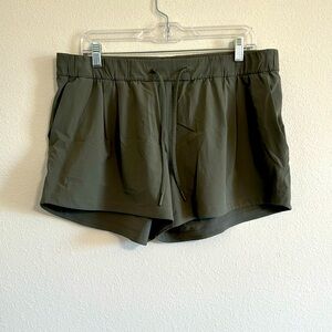 Lululemon shorts pleated. Dusty green. Drawstring. Size 12
